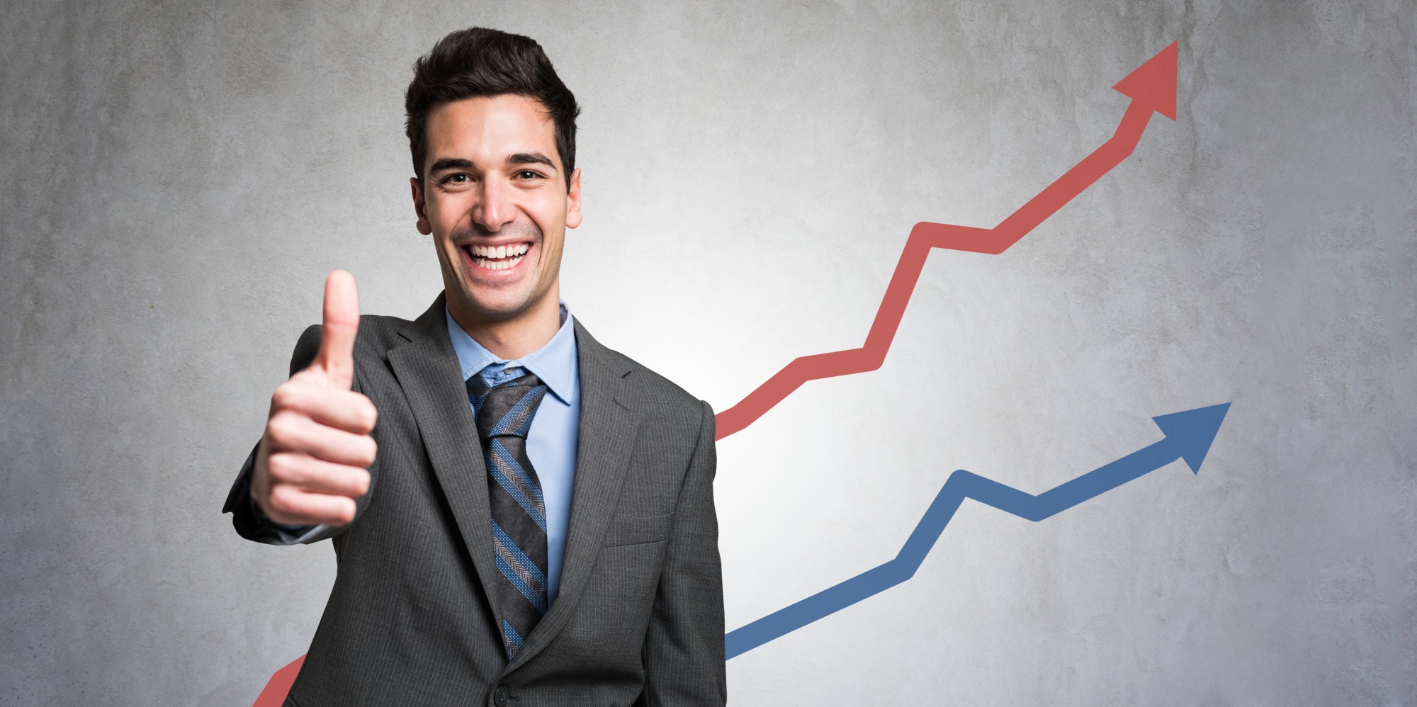 Man giving thumbs up in front of a positive diagram