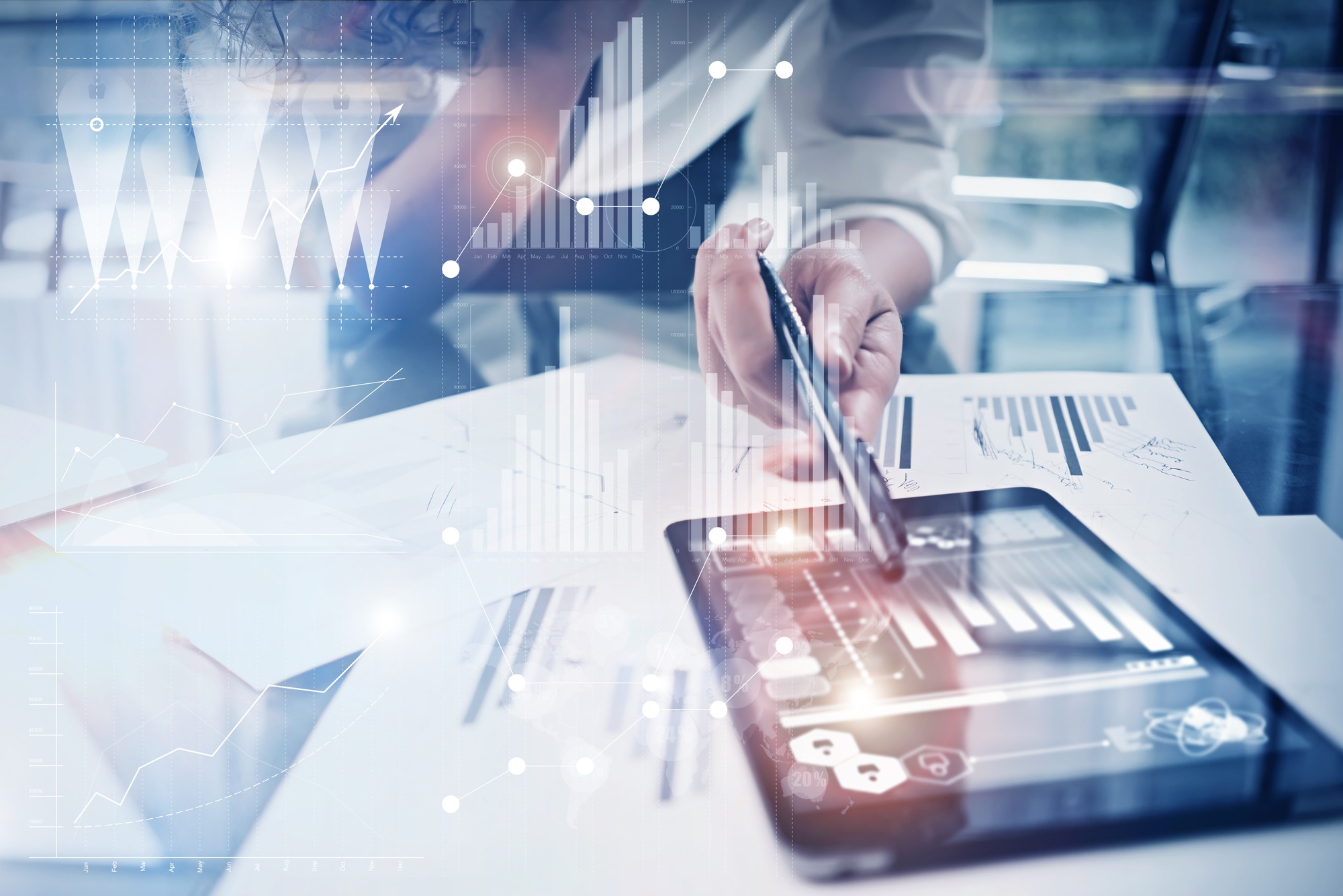 Photo working process. Finance director work new global project in worldwide bank office. Using modern tablet. Graphics icons, tax, stock exchanges interface. Horizontal